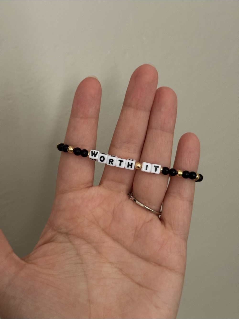 Little Words Project x Maybelline Worth It Black & Gold Beaded Stretch Bracelet - Picture 2 of 3